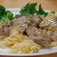 Beef Tenderloin Stroganoff · Tenderloin Medallions Cooked in our 
Stroganoff Sauce with Onions and Mushrooms, Served over...