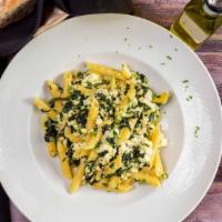 Penne Spinach Ricotta · Penne pasta sautéed with fresh ricotta cheese, spinach, olive oil, and garlic.