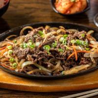 Bulgogi Beef · Thinly sliced rib eye beef in a sweet and soy sauce with carrots, onions and green onions.