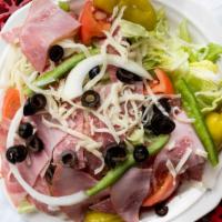 Antipasto Salad · Lettuce, tomatoes, onions, green peppers, black olives, mozzarella, pepperoncini, ham and sa...