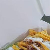 *Grilled Chicken Nachos · *Notice: Foods cooked to order, consuming raw or undercooked meats, poultry, seafood, shellf...