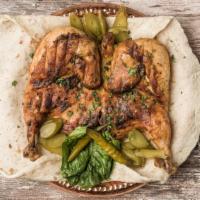 Whole Chicken · Roasted chicken over a charcoal grill can be one of the most flavorful ways to enjoy the gri...