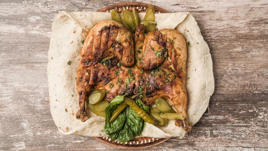 Whole Chicken · Roasted chicken over a charcoal grill can be one of the most flavorful ways to enjoy the grilling taste !