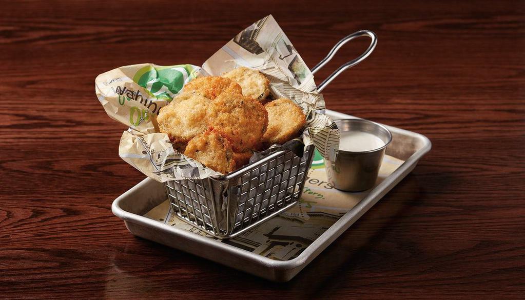 Crispy Fried Pickles · pickles coated in panko bread crumbs & fried, served with creamy ranch dressing