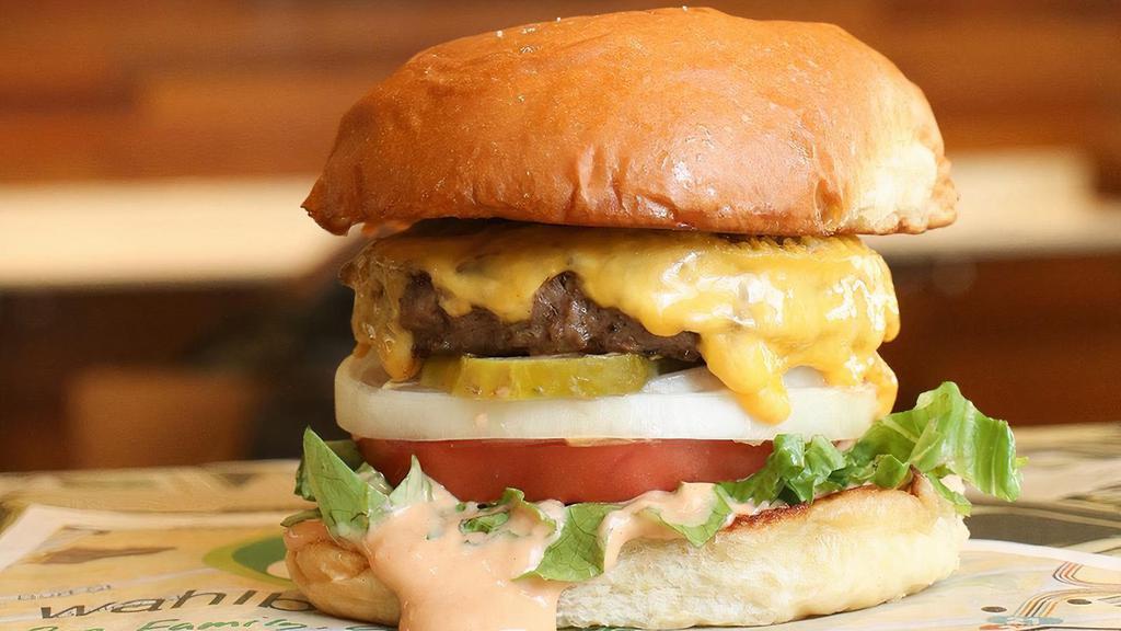 The Our Burger · 1/4 lb. burger, lettuce, tomato, onion, government cheese, Paul’s signature wahl sauce & pickles