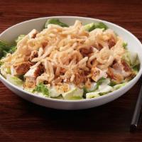 Jenn'S Chicken Salad · marinated seared chicken, caramelized onions, crispy onions & lettuce all chopped & tossed w...