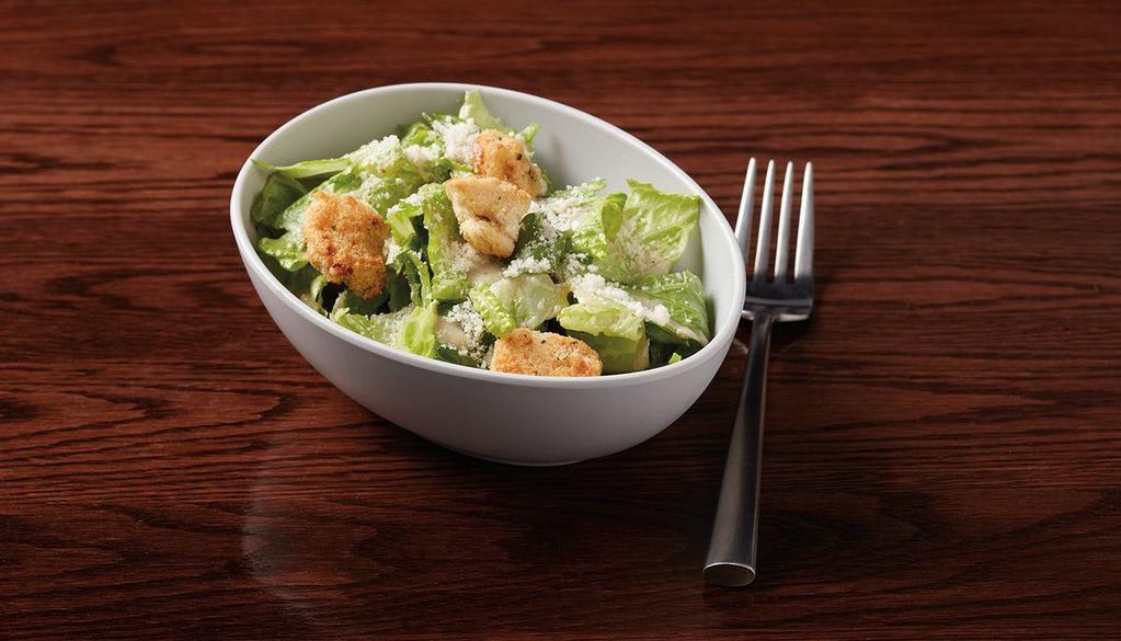 Side Caesar Salad · fresh romaine, housemade croutons & Parmesan cheese served with Caesar dressing**dressing is made with raw egg yolks