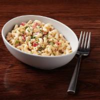 Side Alma'S Macaroni Salad  · elbow macaroni, red onion, sweet peppers, celery, parsley and mom's favorite mayo