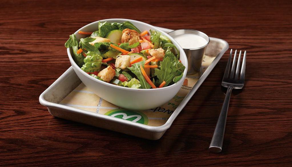 Side Salad · fresh romaine, arugula, housemade croutons, cucumbers, carrots & tomatoes served with dressing of choice