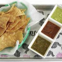 Chips & Salsas · Tortilla chips with three house made salsas: salsa roja, salsa verde and salsa cruda (DF, V)