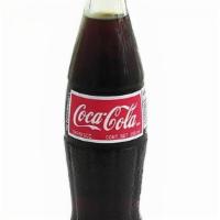 Mexican Coke · 12oz glass bottle *NOTE* cap not a twist off