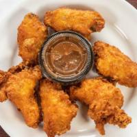 Chicken Wings · Six deep-fried bone-in wings with your choice of sauce. Napkins recommended.