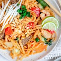 Pad Thai · Thin rice noodles with eggs, bean sprouts and green onion stir-fried in traditional sauce to...