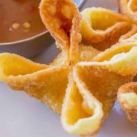 Crab Rangoon (4 Pieces) · Cream cheese, carrots, celery, green onions, and imitation crab deep fried in a wonton wrapp...