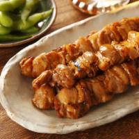 Chicken Satay (4 Pieces) · Marinated chicken on a stick served with peanut sauce.