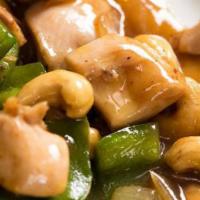 Cashew Chicken · Cashew nuts, pineapple, green/red bell pepper, onions, bamboo, water chestnuts in brown sauce.