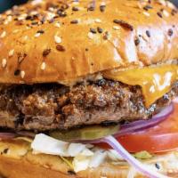 Classic All American Burger · Black angus beef patty, American cheese, red onion, pickles, lettuce, tomato, and mayo on a ...