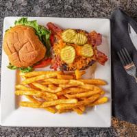 Bacon Cheddar Burger · 1/2 lb certified angus beef burger, topped with sharp cheddar cheese, apple wood smoked baco...
