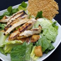 Chicken Caesar Salad · Chopped romaine, croutons, parmesan cheese, tossed with Caesar dressing and topped with gril...
