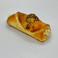 Zaatar & Cheese · Best of both worlds, Filled with Zaatar and Spanish Cheese on the inside and topped with dry...