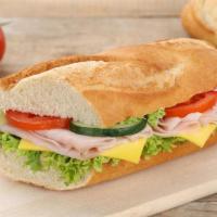Turkey Sub · Delicious smoked turkey, lettuce, tomatoes, pickles, and mayonnaise in our very own SAJ sub ...