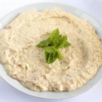 Baba Ganoush · Delicious garlic baked eggplant puree mixed with tahini and drizzled with olive oil