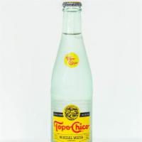 Topo Chico · Topo Chico bottled sparkling mineral water.