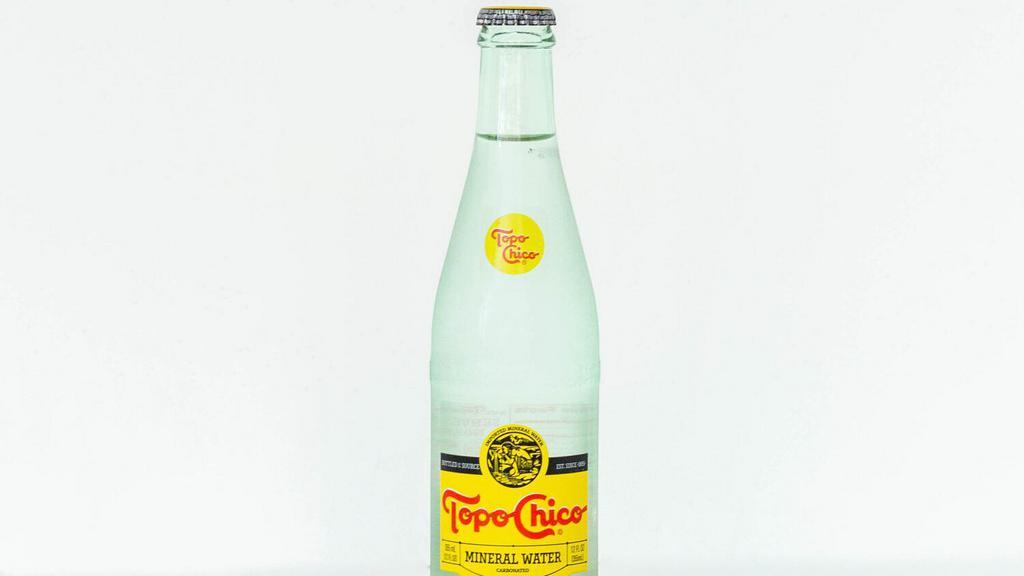 Topo Chico · Topo Chico bottled sparkling mineral water.