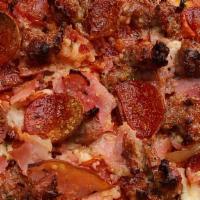 Classic Meat Pizza · Provolone cheese, pepperoni, ham, bacon, sausage.