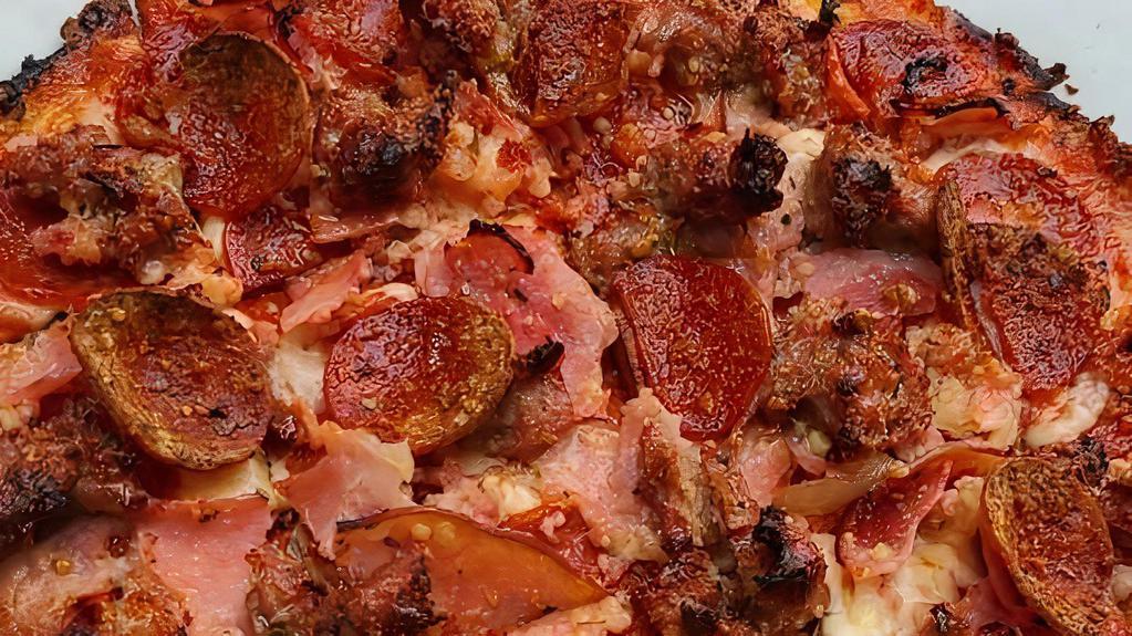 Classic Meat Pizza · Provolone cheese, pepperoni, ham, bacon, sausage.