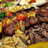 Moe'S Tray (For 2) · Comes with meat and chicken shawarma, shish kabob, shish tawook and shish kofte, hummus, ric...