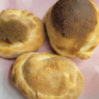 Small Calzones · Made at our sister restaurant, Off Center, these calzones are made with fermented dough, tas...