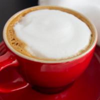 Cappuccino · Double espresso (Brioso 2.0), 2oz steamed milk, 2oz foam.