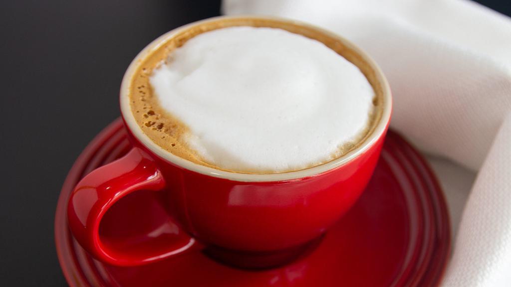 Cappuccino · Double espresso (Brioso 2.0), 2oz steamed milk, 2oz foam.
