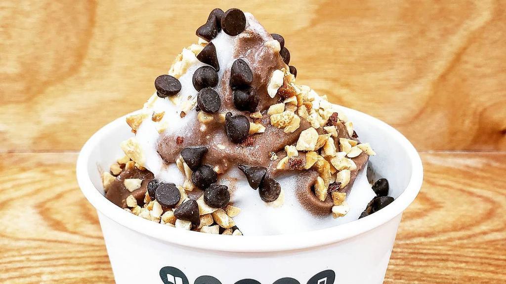 Vegan Soft Serve · Oat based vegan soft serve with different flavors every weekend. All toppings are vegan.  Delivered in soft serve bowl with clear lid.