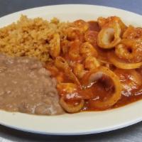 Shrimp À La Diabla · Spicy. Shrimp sauce served with rice, lettuce, tomato, and sour cream with choice of flour o...