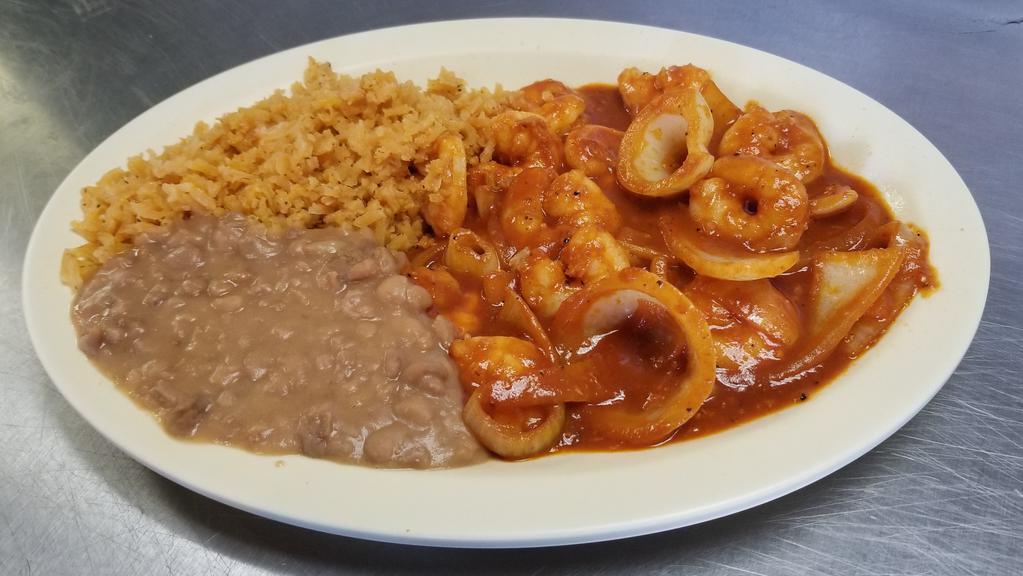 Shrimp À La Diabla · Spicy. Shrimp sauce served with rice, lettuce, tomato, and sour cream with choice of flour or corn tortillas.