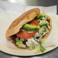 Torta Mexicana · Authentic Mexican sandwich is prepared with a choice of meat along with lettuce, cheese, tom...