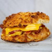 Bacon Egg And Cheese · Three crispy layers of bacon with an American Cheese on fluffy eggs with our Famous Big Mout...
