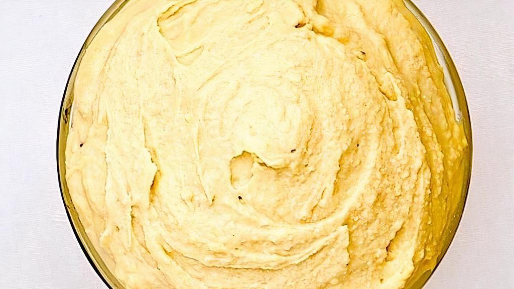 -Side Of Hummus · Homemade Hommus with Pita Bread or Chips