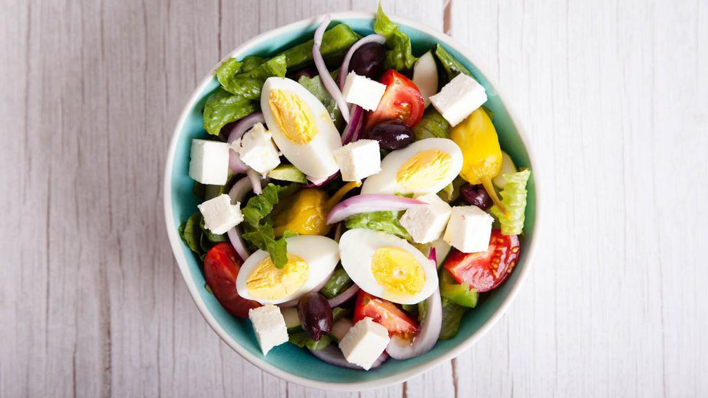 Chef Salad · Fresh Salad made with mixed greens, a hard-boiled egg, ham, tomatoes, cucumbers, and cheese. Served with customer's choice of dressing.