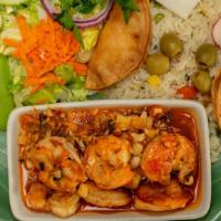 Camarones Al Mojo De Ajo · Plump shrimp abound Mexico's coast line. One of the most succulent ways of serving them is t...