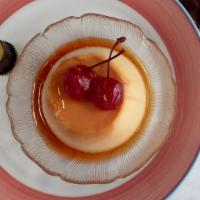 Flan Con Rompope · Mexico's classic dessert. Vanilla custard served with Mexican egg nog.