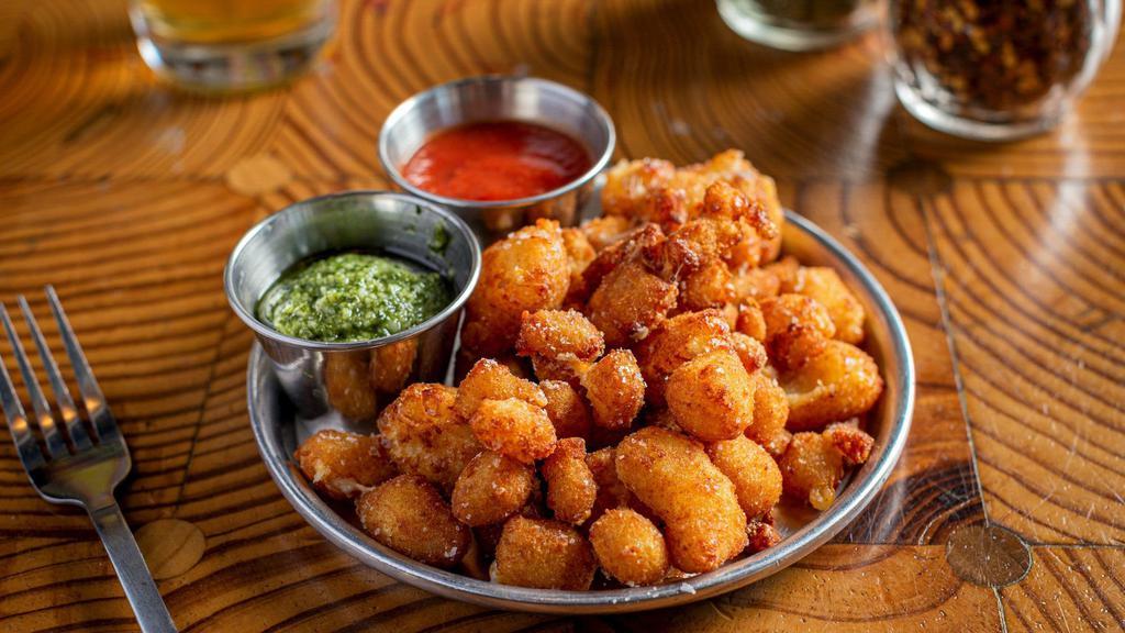 Fried Cheese Balls · (VT) White cheddar cheese curds with a side of arugula pesto and marinara.