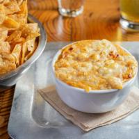 Spicy Corn Dip · (VT, GF) Creamy cheese blend with corn, diced peppers, jalapeno, onion, garlic, thyme, and c...