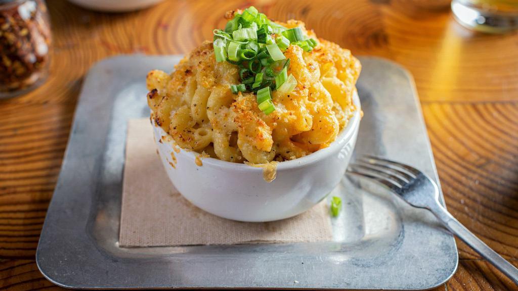 Mac & Cheese · (VT) Cavatappi pasta, cheddar, fontina and parmesan cheese, and fresh cream topped with fresh scallions.