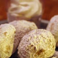 Sober Donuts · 5 fresh made to order doughnut balls lightly coated with powdered sugar and cinnamon.