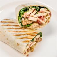 Chicken Caesar Wrap · Grilled chicken breast, bacon, shredded lettuce, parm cheese and Caesar dressing and grilled...