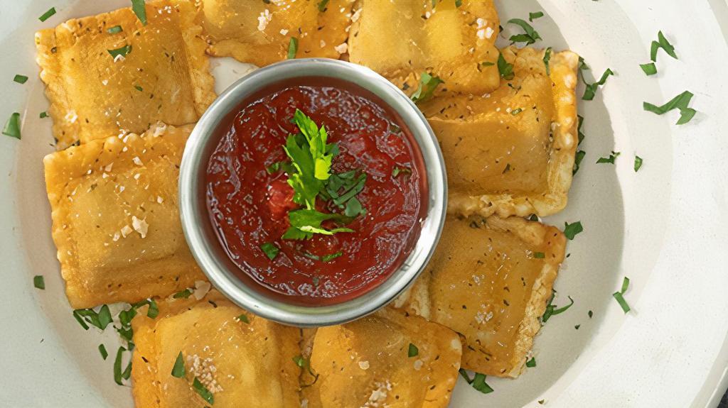 Ravioli · Deep fries meat or cheese raviolis served with our signature red sauce.