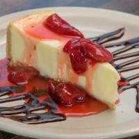 Ny Cheesecake (2 Slices) · Served plain or with strawberry topping.